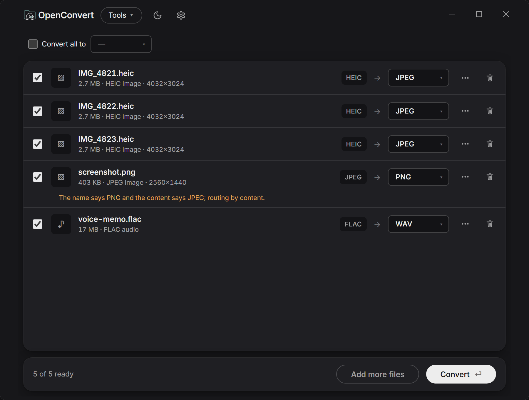 A batch of five files queued in OpenConvert, each with its own source format and target.